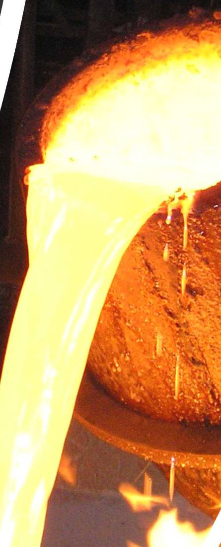 Molten metal poured from a ladle at the foundry
